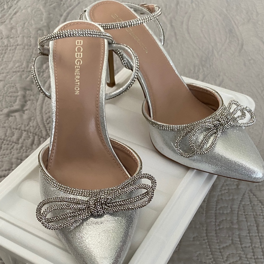 BCBGeneration Metallic Silver Heels with Bow Accent